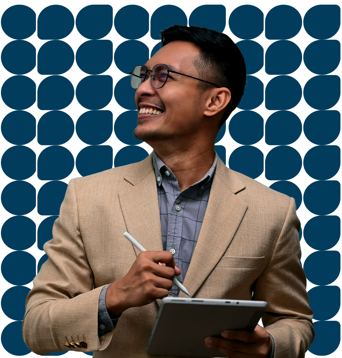 Man with a tablet smiling